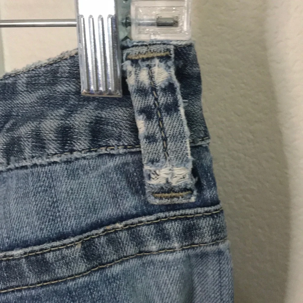 Calvin Klein distressed medium dark wash jeans 10